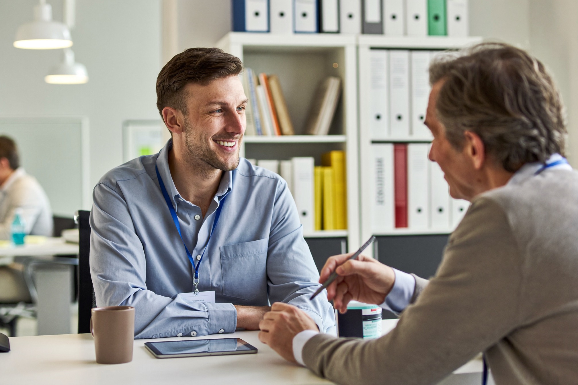 A healthcare consultant reviewing plan options with a client